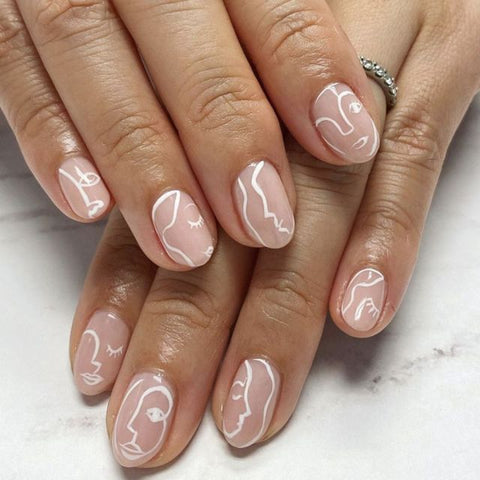 Middle length false nails with heart pattern Inpluser
